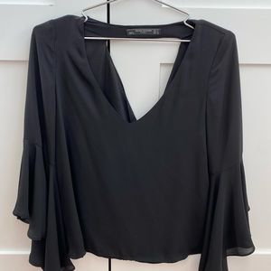 Black top with open back